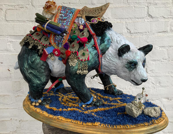 A unique commission based off of clients favorite object (a belly dancing belt), favorite animal (panda), and hobby (astronomy)